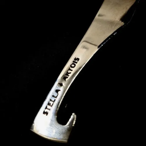 DESTAPADOR STELLA ARTOIS DAGA ACERO